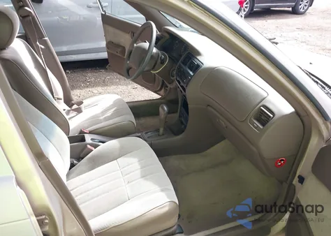 1996 Toyota Corolla from USA, damaged, VIN 2T1BA02E9TC130951